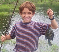 My son Caleb with his first crappie